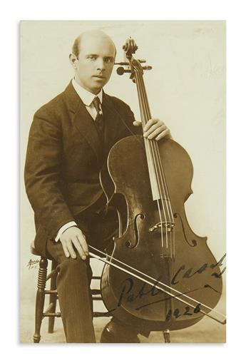 CASALS, PABLO. Two items, each Signed: Autograph Musical Quotation, from the prelude of J.S. Bachs Suite in C Major * Photograph.
